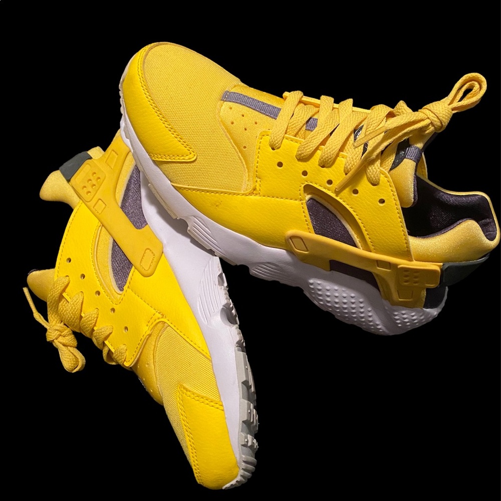 Yellow Nike shoes